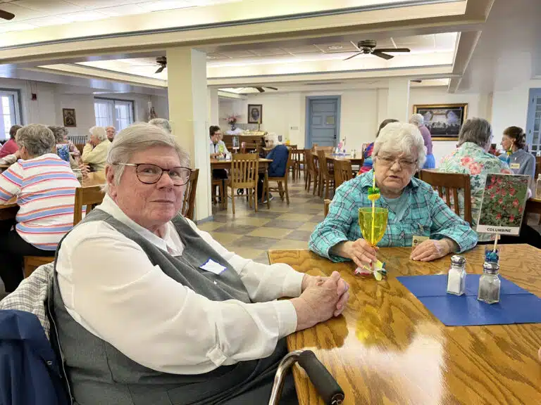 Glenmary Sister Pat Leighton, left, joins Ursuline Sister Cecelia Joseph Olinger in the dining room. Glenmary Sister Pat Leighton, left, joins Ursuline Sister Cecelia Joseph Olinger in the dining room.