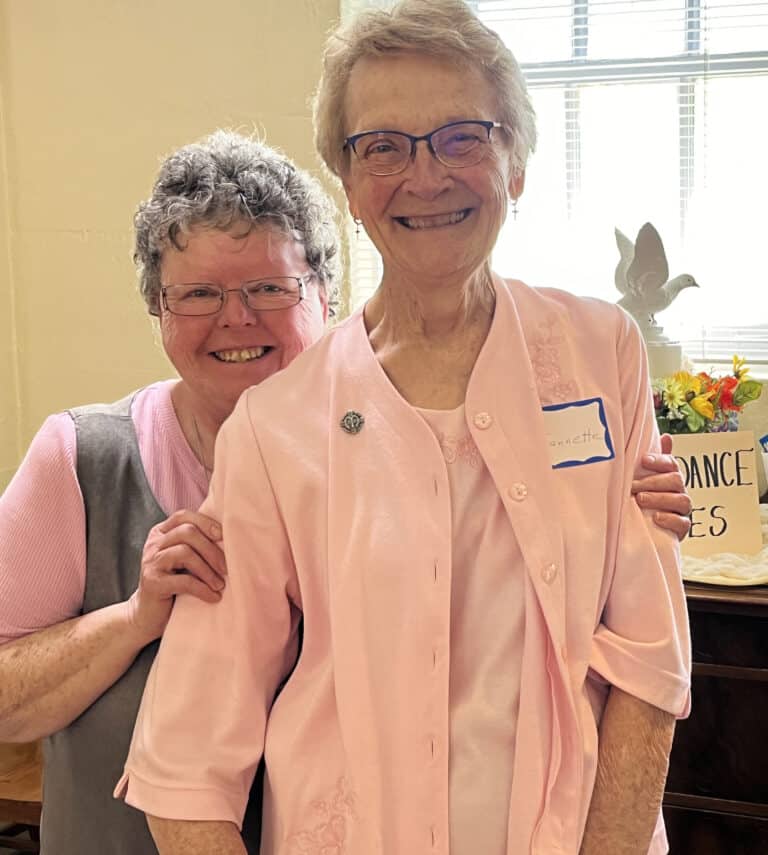 Glenmary Sister Darlene Presley, left, and Sister Jeannette Fennewald, a School Sister of Notre Dame, smile big for the camera. They are both on the Council of Religious Steering Committee.