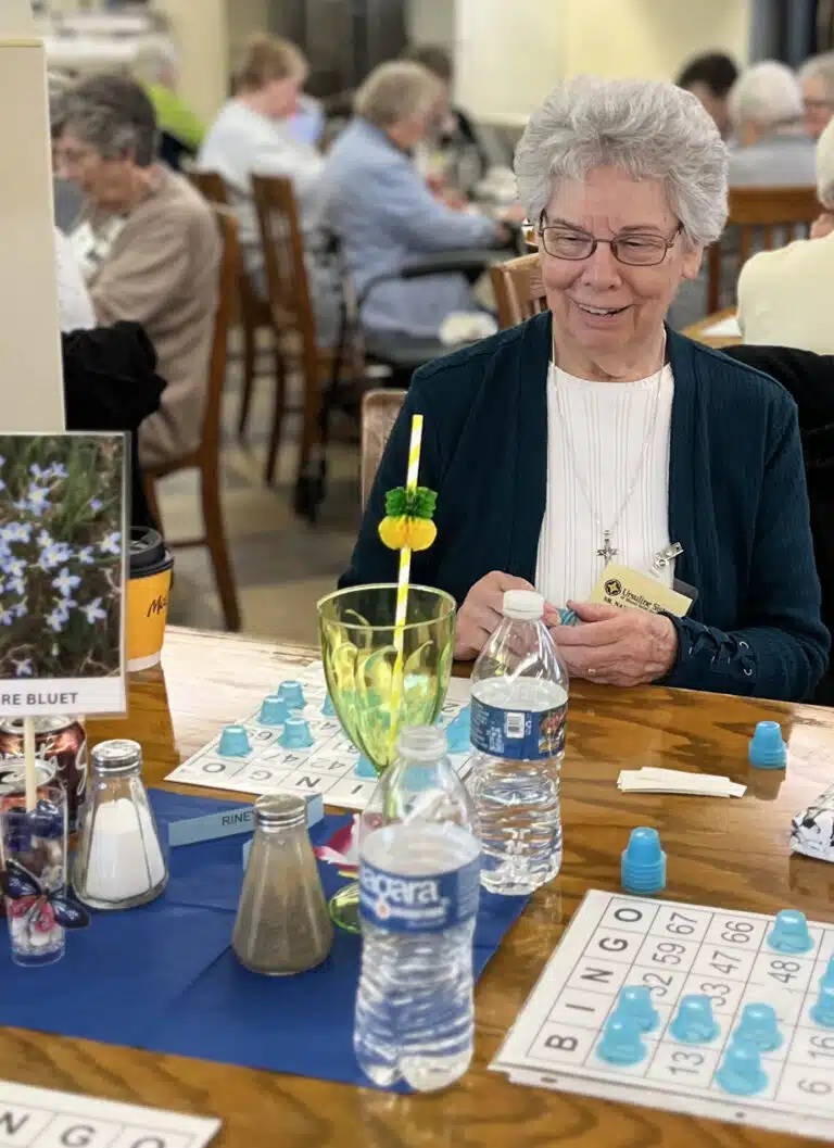 Sister Nancy Murphy looks close to victory in her bingo game. Sister Nancy is on the Council of Religious Steering Committee. Sister Nancy Murphy looks close to victory in her bingo game. Sister Nancy is on the Council of Religious Steering Committee.