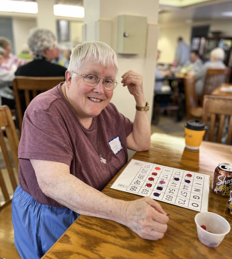 Sister of the Lamb of God Debra Ann Bailey is ready to bingo two different ways.