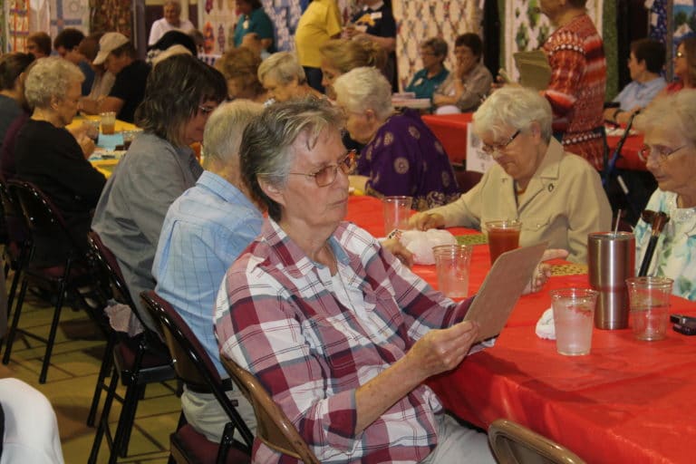 Sister Mary Ellen focuses on her bingo card