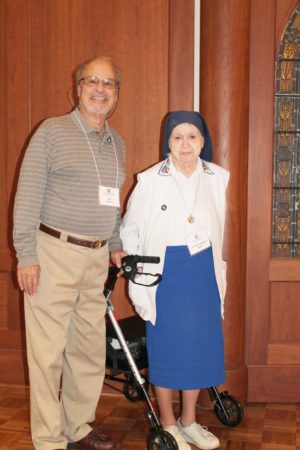 Victor Monaco smiles for a picture with his contact companion, Sister Marie William Blyth, after making his commitment as an Ursuline Associate.