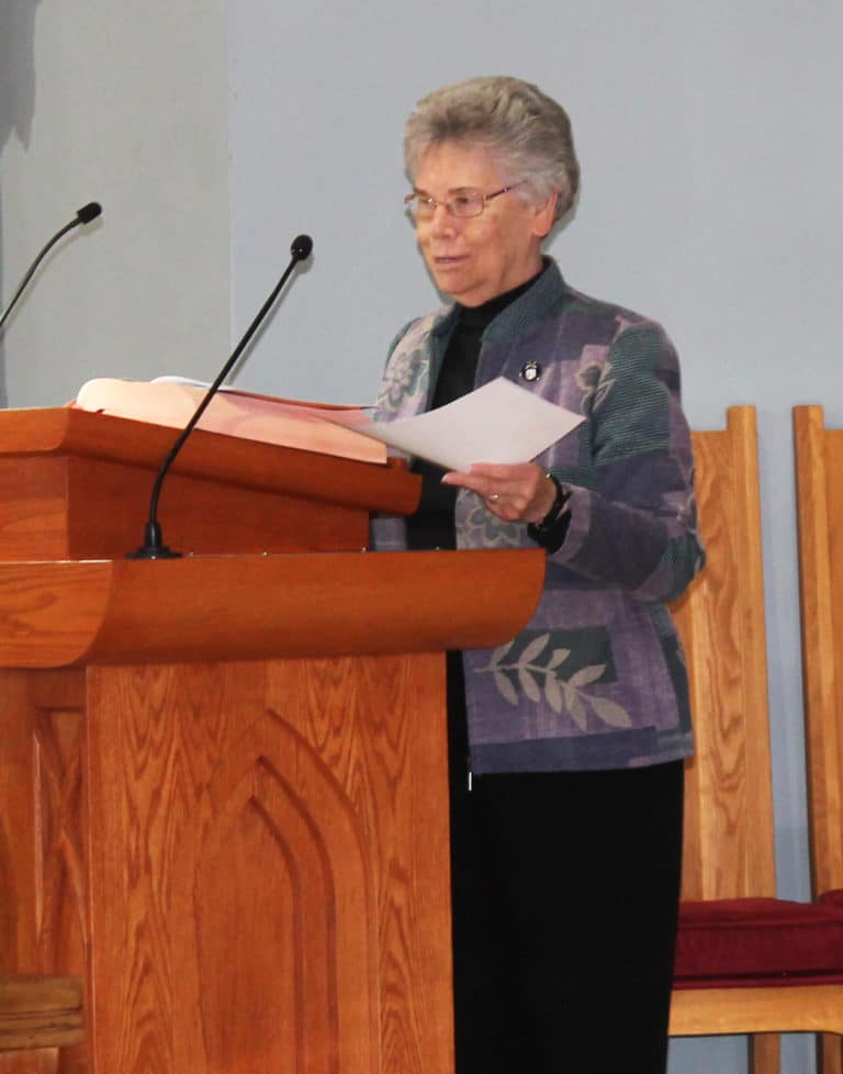 Sister Nancy Murphy, a member of the Steering Committee, recognizes Sister Marie Montgomery, who was unable to attend. Sister Marie is celebrating 75 years.