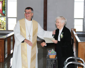 Ursuline Sister Mary Irene Cecil is all smiles after receiving congratulations from Bishop William Medley. Sister Mary Irene is celebrating 70 years as an Ursuline.