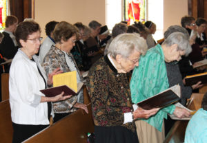 Singing the closing hymn “Lift Up Your Hearts” are, from left, Ursuline Sisters Mary Henning, Elaine Burke, Fran Wilhelm and Sheila Anne Smith.