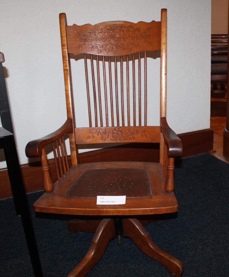 Father Volk’s chair. The desk this chair accompanies is currently in storage.