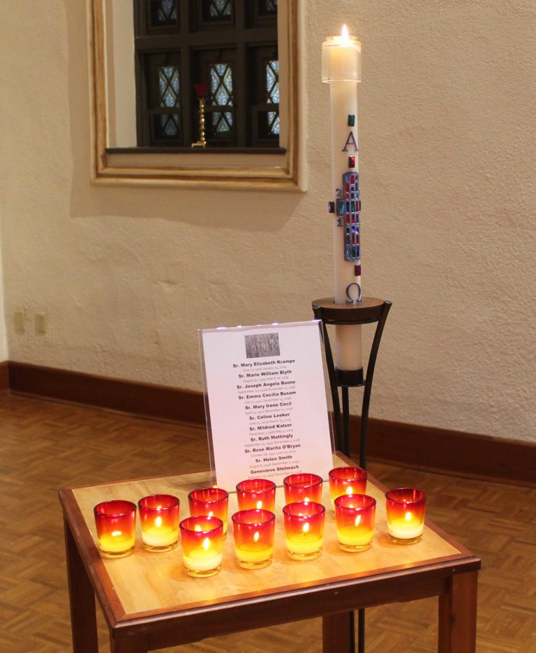 Candles were lighted in remembrance of the 10 Ursuline Sisters and Genevieve Stelmach who died in the past year.