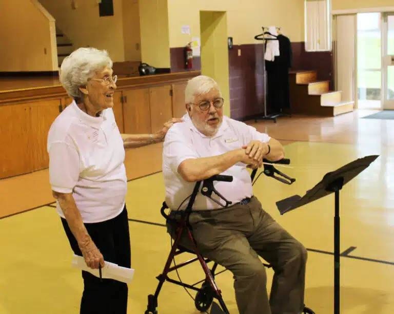 Sister Elaine Burke visits with James White, the former director of the music camp, during rehearsal on June 8. Sister Elaine was White’s assistant for many years of the camp. Sister Elaine Burke visits with James White, the former director of the music camp, during rehearsal on June 8. Sister Elaine was White’s assistant for many years of the camp.