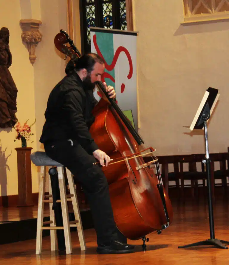 Matthew Boothe performs “Celestial Dance” by Rufus Reid on the double bass. Boothe is preparing to move to Madison, Wis., to play in its orchestra. Matthew Boothe performs “Celestial Dance” by Rufus Reid on the double bass. Boothe is preparing to move to Madison, Wis., to play in its orchestra.