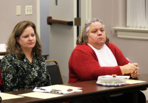 Ursuline Associate Jennifer Kaminski, left, and Judy Curtsinger listen to Sister Pam say that we should look for the seasons in our life, so we can balance stressful times with time to rebound.