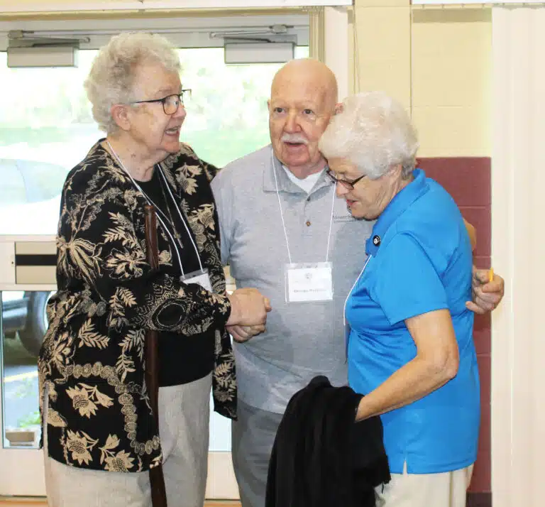Ursuline Sisters Michele Morek, left, and Barbara Jean Head welcome Associate George Horishny from Memphis, Tenn. Ursuline Sisters Michele Morek, left, and Barbara Jean Head welcome Associate George Horishny from Memphis, Tenn.
