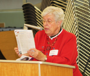 Ursuline Associate Irene Quigley reads some opening prayers to start the Day of Reflection. Later those gathered wished her a happy 90th birthday.