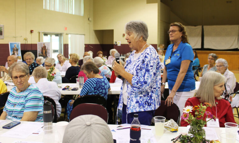 Associate Sid Mason, a Western Kentucky Associate, responds to the Sister panelists and thanks the Sisters for their presence. Standing behind Sid is Doreen Abbott, coordinator of Ursuline Partnerships. Associate Sid Mason, a Western Kentucky Associate, responds to the Sister panelists and thanks the Sisters for their presence. Standing behind Sid is Doreen Abbott, coordinator of Ursuline Partnerships.