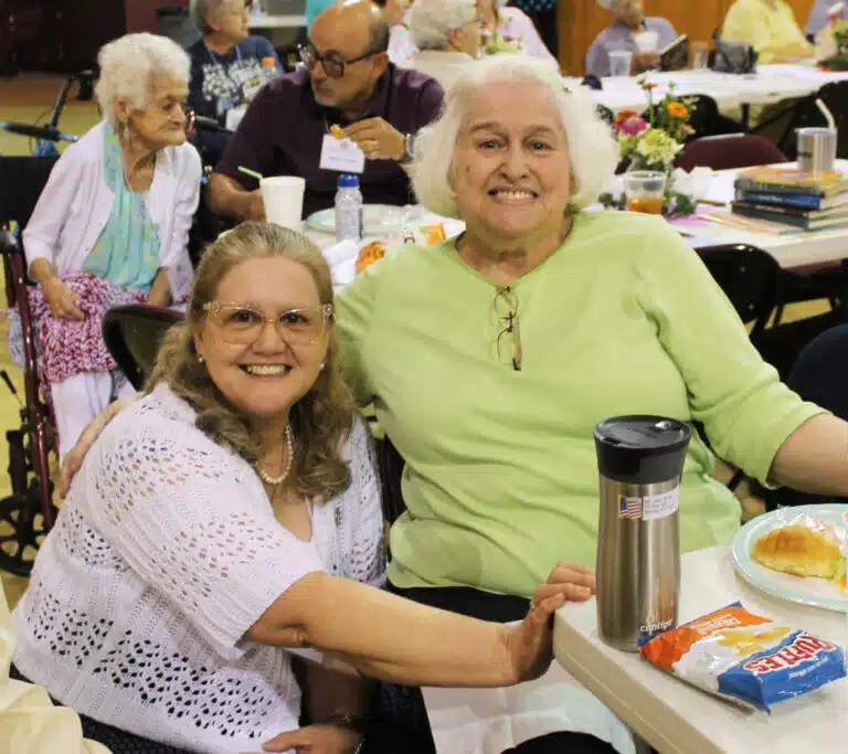 Associate Charlotte Paez, left, visits with Associate Marian Bennett, the retired coordinator of Ursuline Partnerships. The two served in jail ministry together when Charlotte served with the Owensboro Associates. Associate Charlotte Paez, left, visits with Associate Marian Bennett, the retired coordinator of Ursuline Partnerships. The two served in jail ministry together when Charlotte served with the Owensboro Associates.