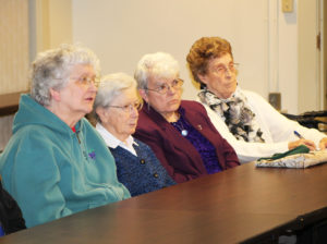 Bishop Medley said that rather than explore the humanity of Jesus, Church leaders chose to exalt Mary through the ages. It had the effect of making Mary seem less relatable to the people who are today’s disciples, Bishop Medley said. Listening to those comments are, from left, Ursuline Sisters Francis Louise Johnson, Grace Swift, Cecelia Joseph Olinger and Elaine Burke.