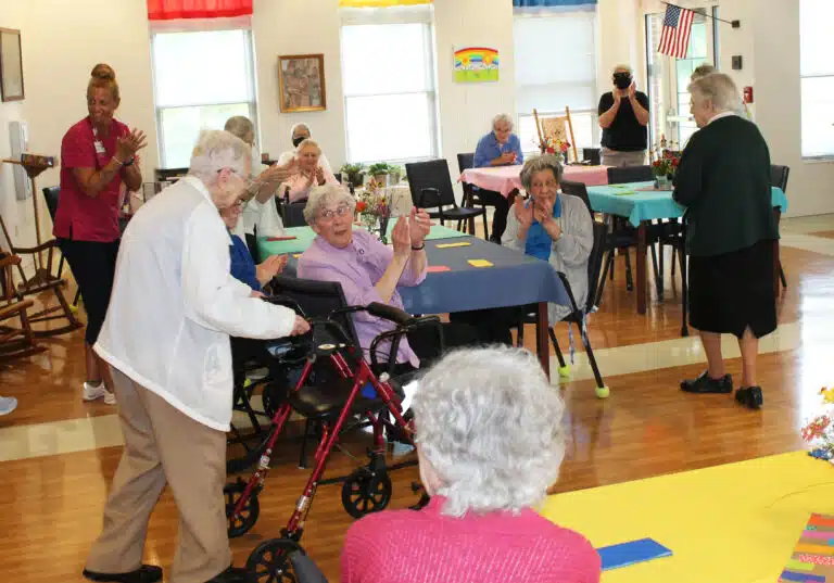 Sister Marie Bosco Wathen receives an ovation as she walks into the Rainbow Room on July 24, 2024. Sister Marie Bosco Wathen receives an ovation as she walks into the Rainbow Room on July 24, 2024.