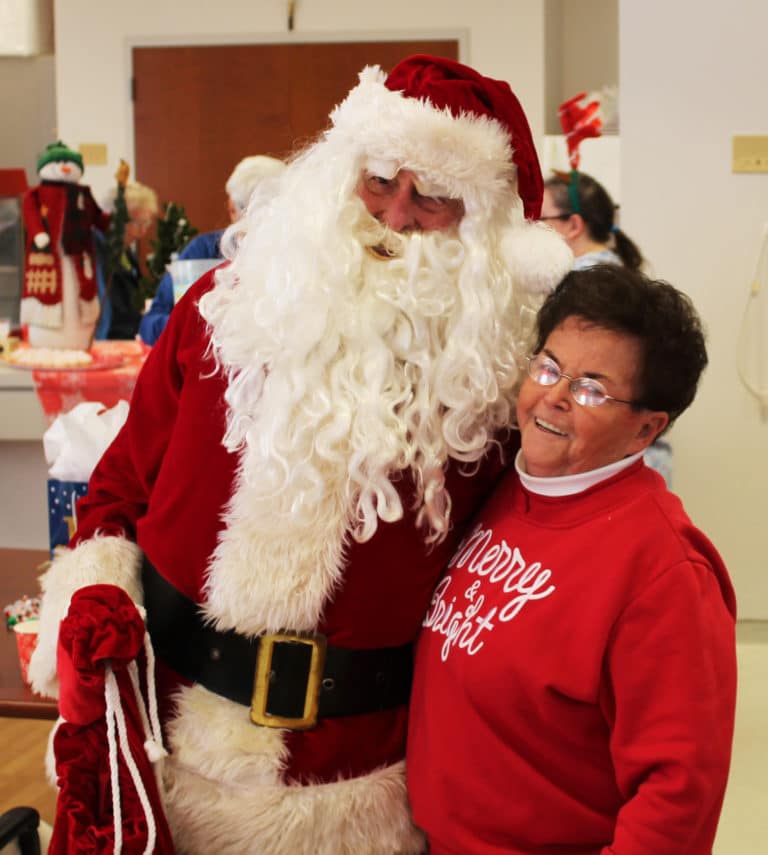 Associate Phyllis Troutman claims to know the identity of Saint Nick – but she’s not telling.