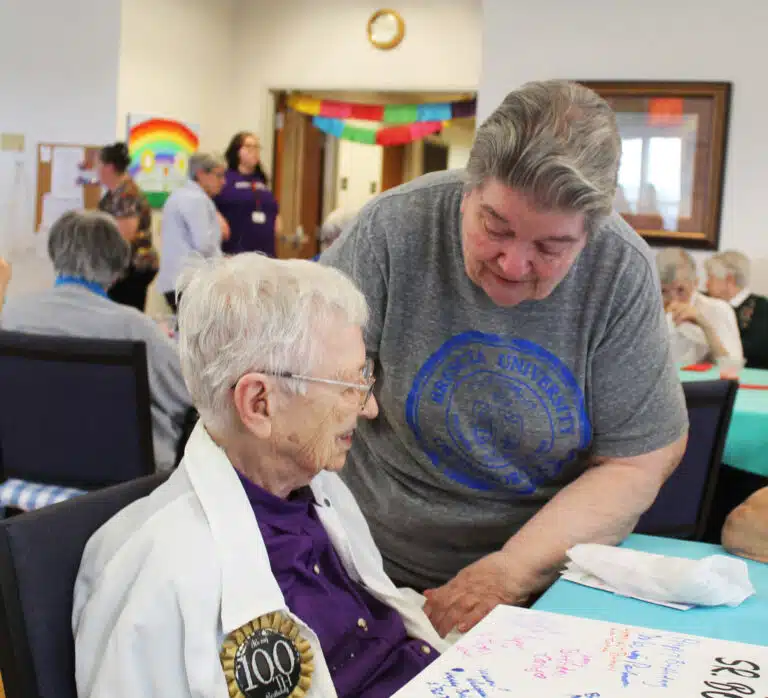Sister Rose Jean Powers wears her Brescia University T-shirt to visit with Sister Marie Bosco. Sister Rose Jean served at Brescia during all but five of the 31 years Sister Marie Bosco served there. Sister Rose Jean Powers wears her Brescia University T-shirt to visit with Sister Marie Bosco. Sister Rose Jean served at Brescia during all but five of the 31 years Sister Marie Bosco served there.