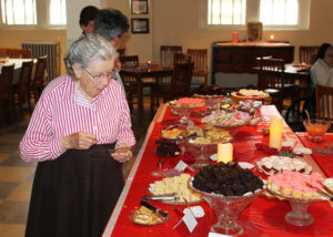 Sister Grace Swift sizes up the brownies as she tries to make her decision on what to eat.