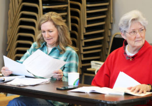 Tonya Logsdon, left, and Anne Renfrow listen to a comment by one of the class members.