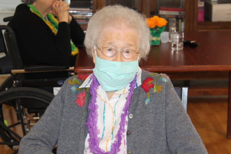 Even with her mask on, you can see Sister Alfreda Malone's smile.