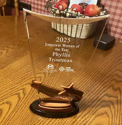A close-up of the Empower Woman of the Year award. A close-up of the Empower Woman of the Year award.