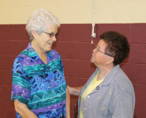 Ursuline Sister Barbara Jean Head, left, talks with Ursuline Associate Phyllis Troutman, of Raywick, Ky.