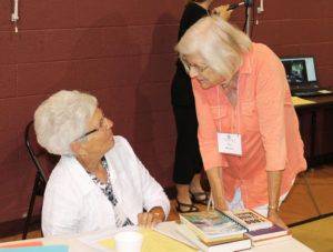 Ursuline Associates Betty Boren, left, of Hopkinsville, Ky., and Pat Wilson, of Murray, Ky., chat during a break. They are both members of the Western Kentucky Associate group.