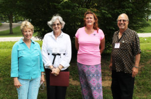 These four Ursuline Associates served on a panel in the afternoon in which they each shared an everyday experience that helped them to know that God is active in their life. From left are Judy Sims, of Belton, Ky.; Pauline Goebel, Louisville; Doreen Abbott, Owensboro; and Victor Monaco, of Kansas City, Mo.
