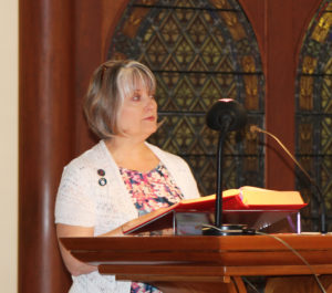 Associate Joyce York was the first lector on the weekend of Corpus Christi.