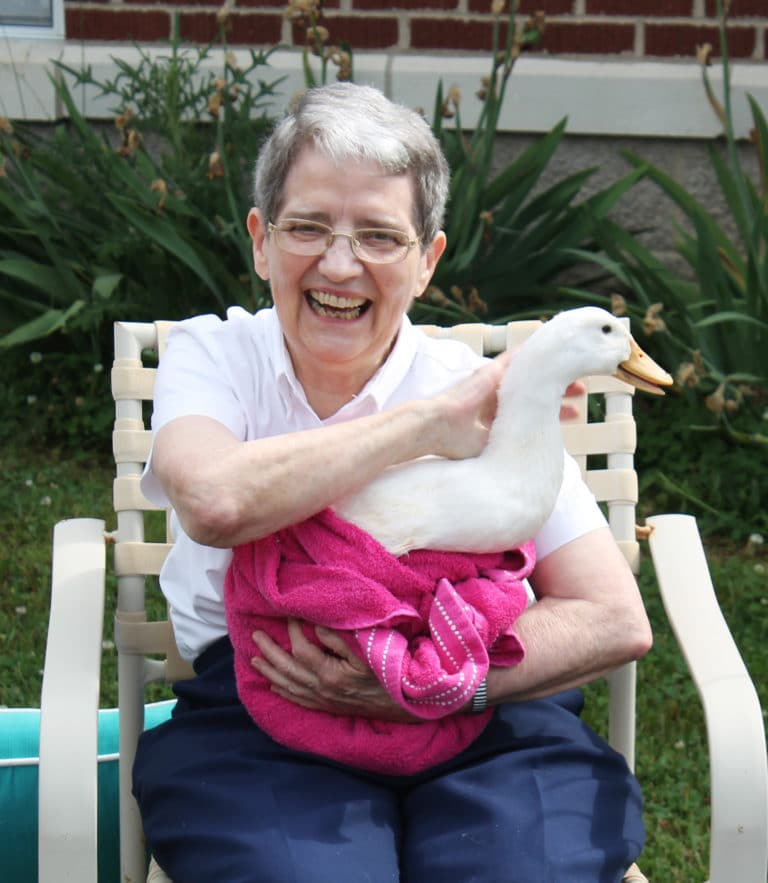 Sister Rose Karen Johnson never knew how much fun it could be to hold a duck.