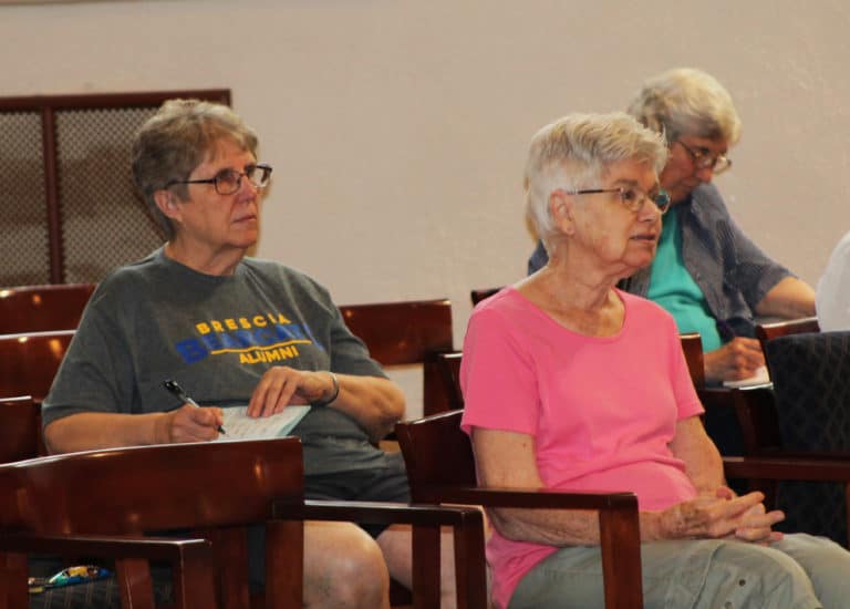 Sister Betsy Moyer, left, Sister Jane Falke, center, and Sister Julia Head follow along with Father Hensell. Sister Jane came all the way from Kansas for Community Days and the retreat week.
