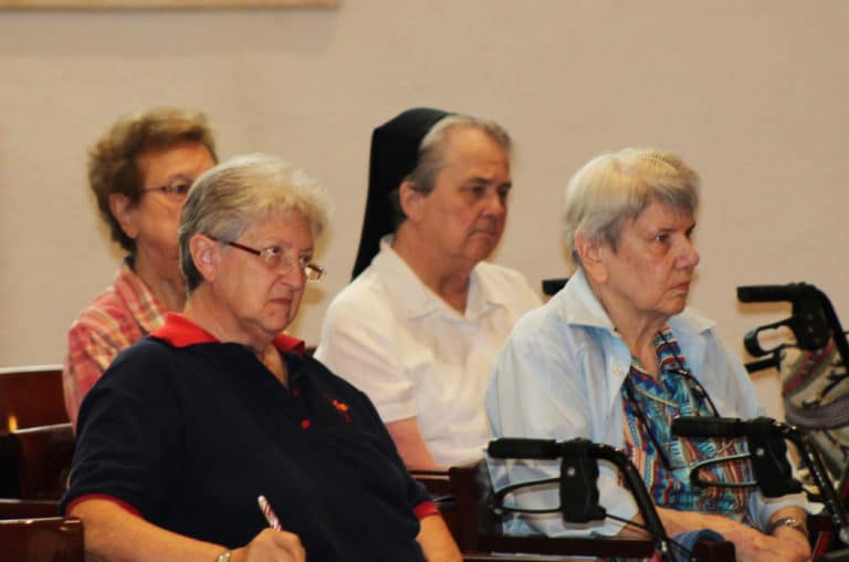 Following Father Hensell’s discussion of the parables are, from left, Sister Susan Mary Mudd, Sister Emma Anne Munsterman, Sister Michael Marie Friedman and Sister Sheila Anne Smith.
