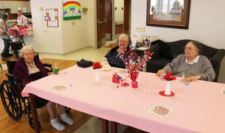 From left, Sister Grace Swift, Sister Catherine Marie Lauterwasser, and Sister Lois Lindle get ready for the Valentine party. From left, Sister Grace Swift, Sister Catherine Marie Lauterwasser, and Sister Lois Lindle get ready for the Valentine party.