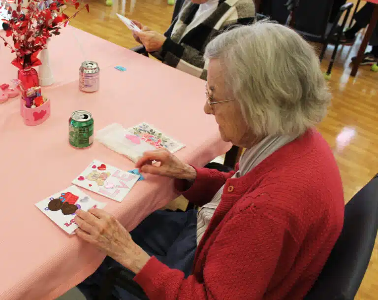 Sister Mary Gerald Payne displays some of the artwork on her handmade Valentines. Sister Mary Gerald Payne displays some of the artwork on her handmade Valentines.