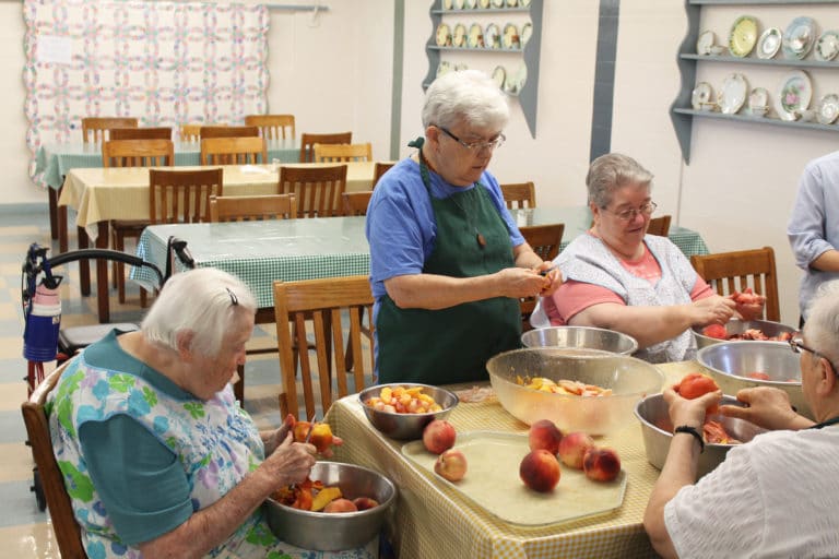 Sisters on slicing duty here are from left are Sister Catherine Kaufman, Sister Cecelia Joseph Olinger, Sister Rose Jean Powers and Sister Sara Marie Gomez.