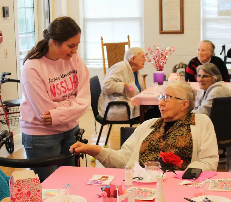 Abby Russel chats with Sister Ruth Gehres after handing out her Valentines. Abby Russel chats with Sister Ruth Gehres after handing out her Valentines.