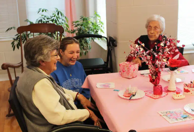 Addy Harris shares a laugh with Sister Margaret Ann Aull, left, and Sister Elaine Burke after they received their Valentines. Addy Harris shares a laugh with Sister Margaret Ann Aull, left, and Sister Elaine Burke after they received their Valentines.
