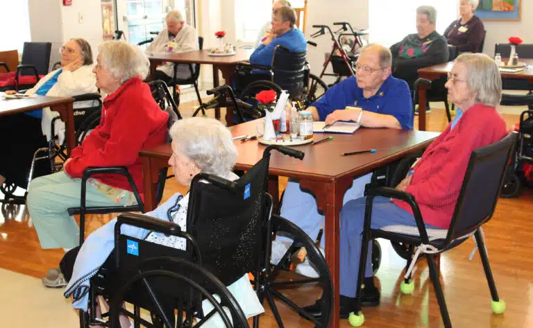 Ursuline Sisters listening to Father Burke are, from left, Sister Francis Louise Johnson, Sister Grace Swift, Sister Kathleen Dueber and Sister Mary Gerald Payne. Father Burke told a story about getting a flat tire earlier this year during a torrential downpour. He used it as an example of leveraging hope. “When I lean into hope, I recognize Jesus saying, ‘I am with you in this. Trying to get the lug nuts off,’” he said. Ursuline Sisters listening to Father Burke are, from left, Sister Francis Louise Johnson, Sister Grace Swift, Sister Kathleen Dueber and Sister Mary Gerald Payne. Father Burke told a story about getting a flat tire earlier this year during a torrential downpour. He used it as an example of leveraging hope. “When I lean into hope, I recognize Jesus saying, ‘I am with you in this. Trying to get the lug nuts off,’” he said.