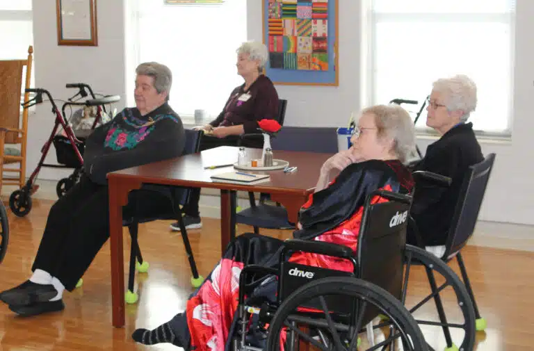 From left, Sisters Rose Jean Powers, Pam Mueller, Pat Rhoten and Barbara Jean Head engage with Father Burke’s talk. “Saint Bernard of Clairvaux said, ‘You need books in both hands. In one hand the Holy Scriptures, in the other the book of experiences,” Father Burke said. From left, Sisters Rose Jean Powers, Pam Mueller, Pat Rhoten and Barbara Jean Head engage with Father Burke’s talk. “Saint Bernard of Clairvaux said, ‘You need books in both hands. In one hand the Holy Scriptures, in the other the book of experiences,” Father Burke said.