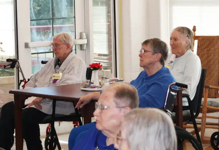 Sisters Grace Simpson, left, Melissa Tipmore, center, and Marie Carol Cecil listen to Father Burke talk about dealing with failure. “When we fail, we need to examine,” he said. “Even in our failures, that’s where we find Christ waiting for us.” Sisters Grace Simpson, left, Melissa Tipmore, center, and Marie Carol Cecil listen to Father Burke talk about dealing with failure. “When we fail, we need to examine,” he said. “Even in our failures, that’s where we find Christ waiting for us.”