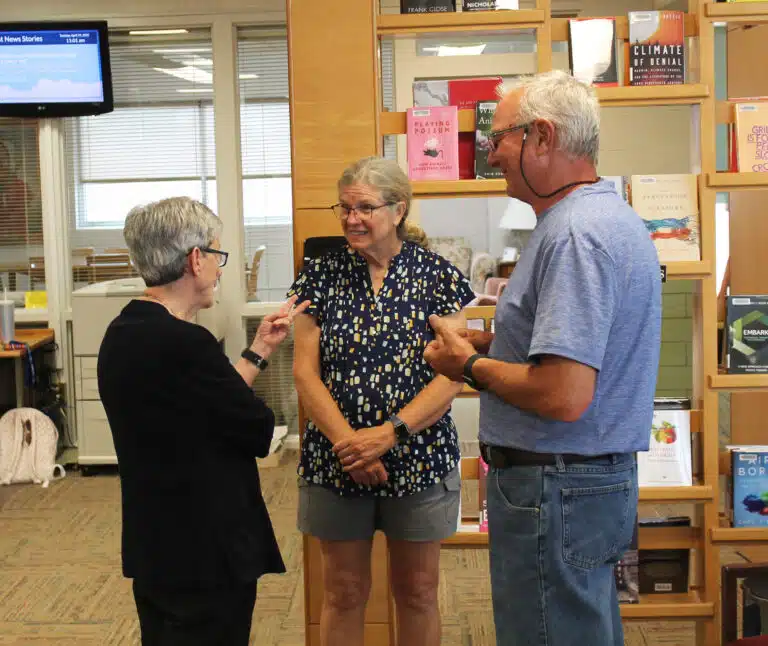 Sister Judith Nell, left, talks with Karen and Charlie Austin during her retirement celebration. The two are longtime friends of Sister Judith Nell who attended Brescia. Sister Judith Nell, left, talks with Karen and Charlie Austin during her retirement celebration. The two are longtime friends of Sister Judith Nell who attended Brescia.