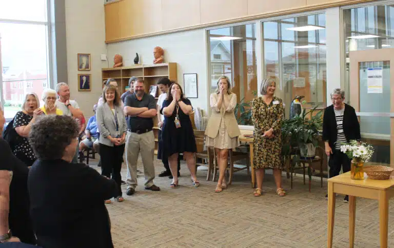 Sister Judith Nell, right, has the people gathered in the library laughing as she recalls one of her many pranks. Sister Judith Nell, right, has the people gathered in the library laughing as she recalls one of her many pranks.