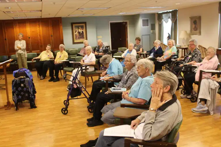 The Sisters gather in the St. Ursula Community Room and sing along with a video of “It’s a Wonderful World.” The Sisters gather in the St. Ursula Community Room and sing along with a video of “It’s a Wonderful World.”