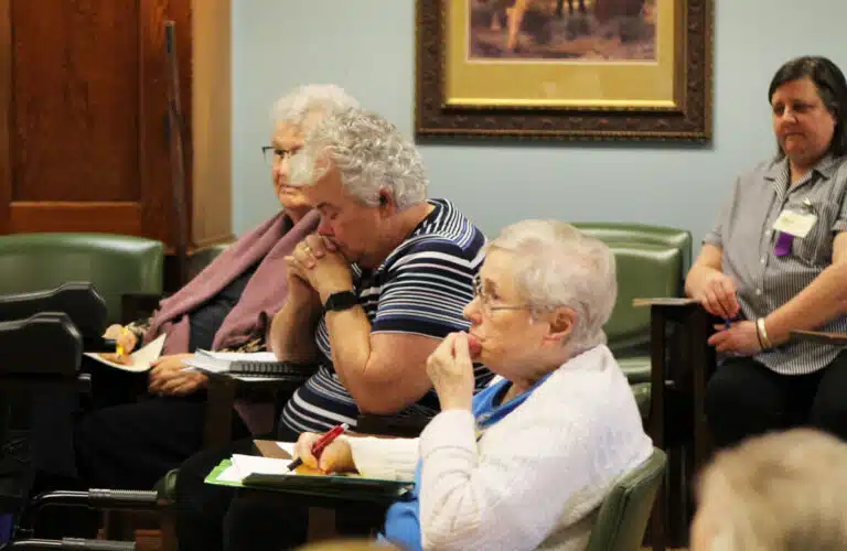 Sister Michele Morek, left, Sister Martha Keller, center, Sister Karla Kaelin, right, and Sister Monica Seaton in the background reflect on Jan Novotka asking them to write about something significant. “It doesn’t have to be profound. But it will be in its simplicity,” she said. Sister Michele Morek, left, Sister Martha Keller, center, Sister Karla Kaelin, right, and Sister Monica Seaton in the background reflect on Jan Novotka asking them to write about something significant. “It doesn’t have to be profound. But it will be in its simplicity,” she said.