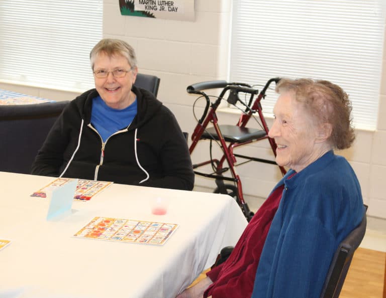 Sister Melissa Tipmore, left, and Sister Marie Carol Cecil are happy to be at the party.