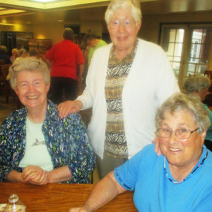 Sister Michele Morek, left, Sister Ruth Gehres, center, and Sister Karla Kaelin share smiles for a guest photographer.
