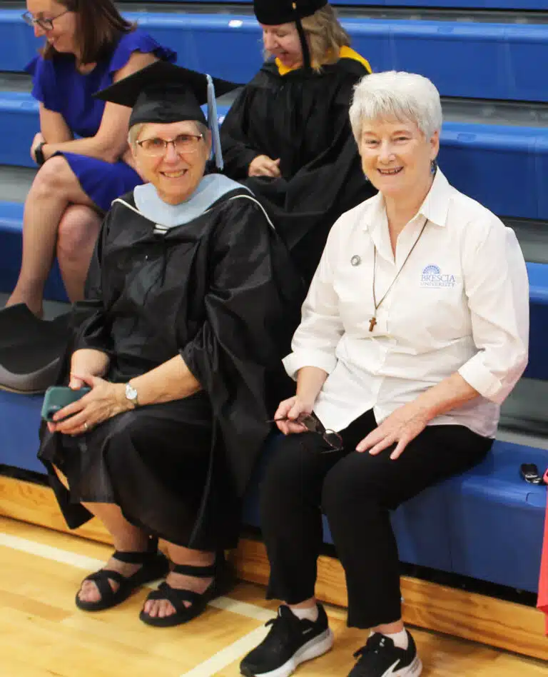 Sister Betsy Moyer, left, and Sister Pam Mueller gather with others in the Brescia gymnasium prior to processing to the Cathedral. Sister Pam is director of Campus Ministry at Brescia. Sister Betsy Moyer, left, and Sister Pam Mueller gather with others in the Brescia gymnasium prior to processing to the Cathedral. Sister Pam is director of Campus Ministry at Brescia.