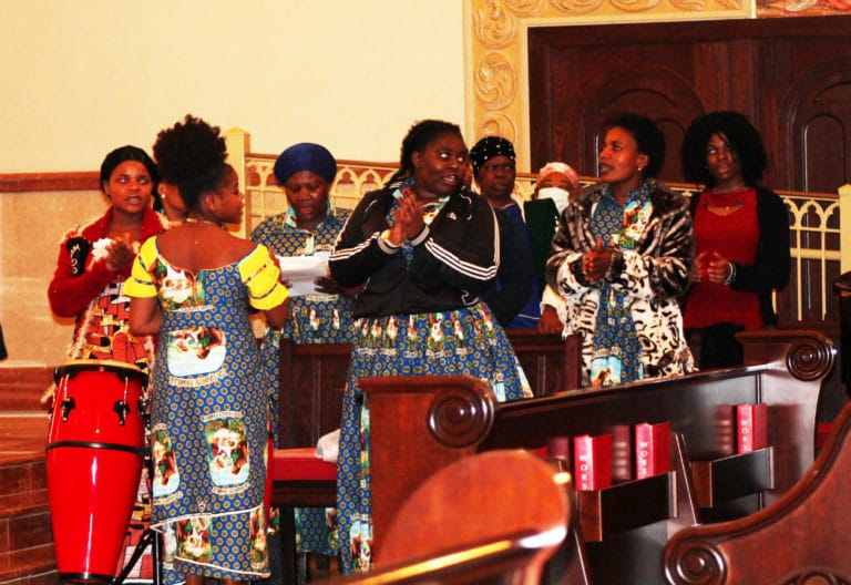 Members of the Congolese choir from Holy Spirit Church in Bowling Green sing their opening hymn.