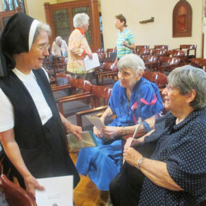 Gathering in the Motherhouse Chapel are, from left, Sisters Rose Karen Johnson, Sheila Anne Smith and Rosemary Keough.